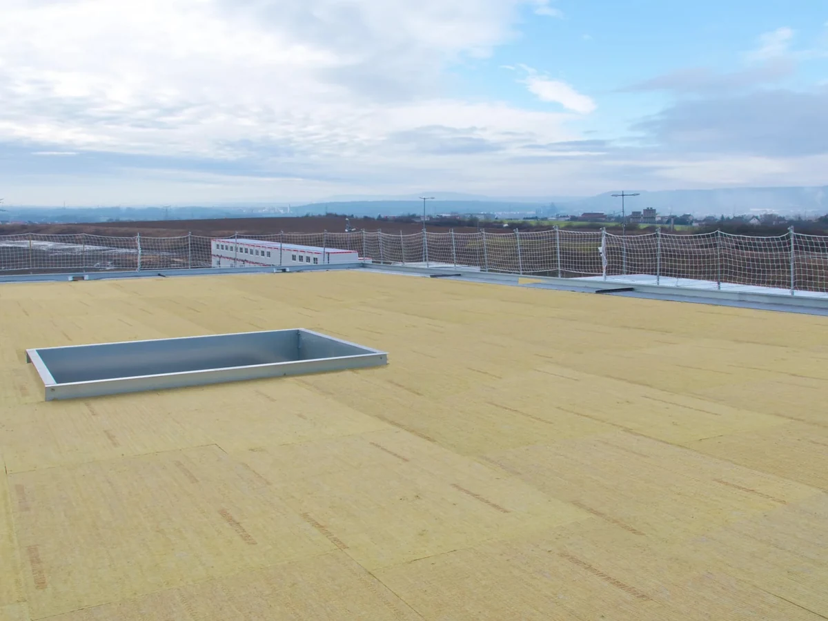Roof insulation installation detail at structural roof elements